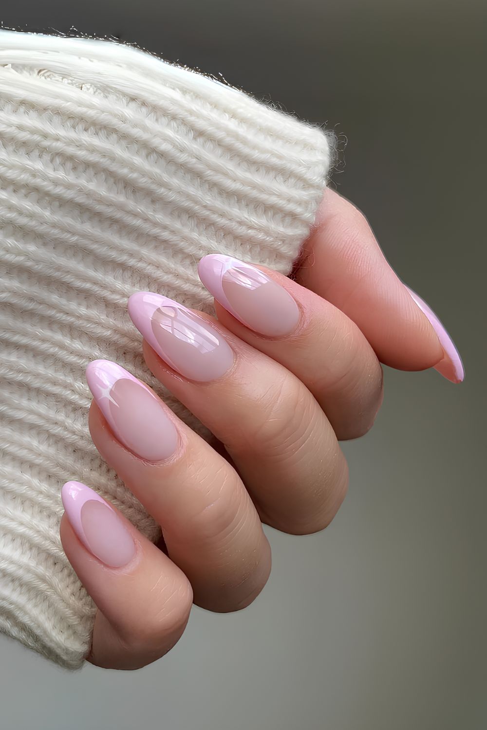 Light pink french tips with tiny starburst details