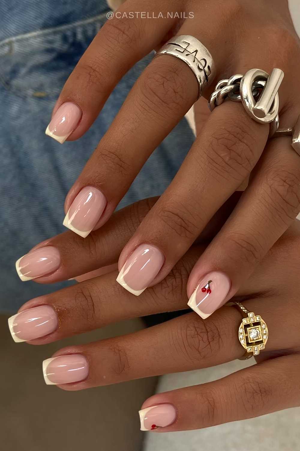 Micro vanilla French nails with cherries