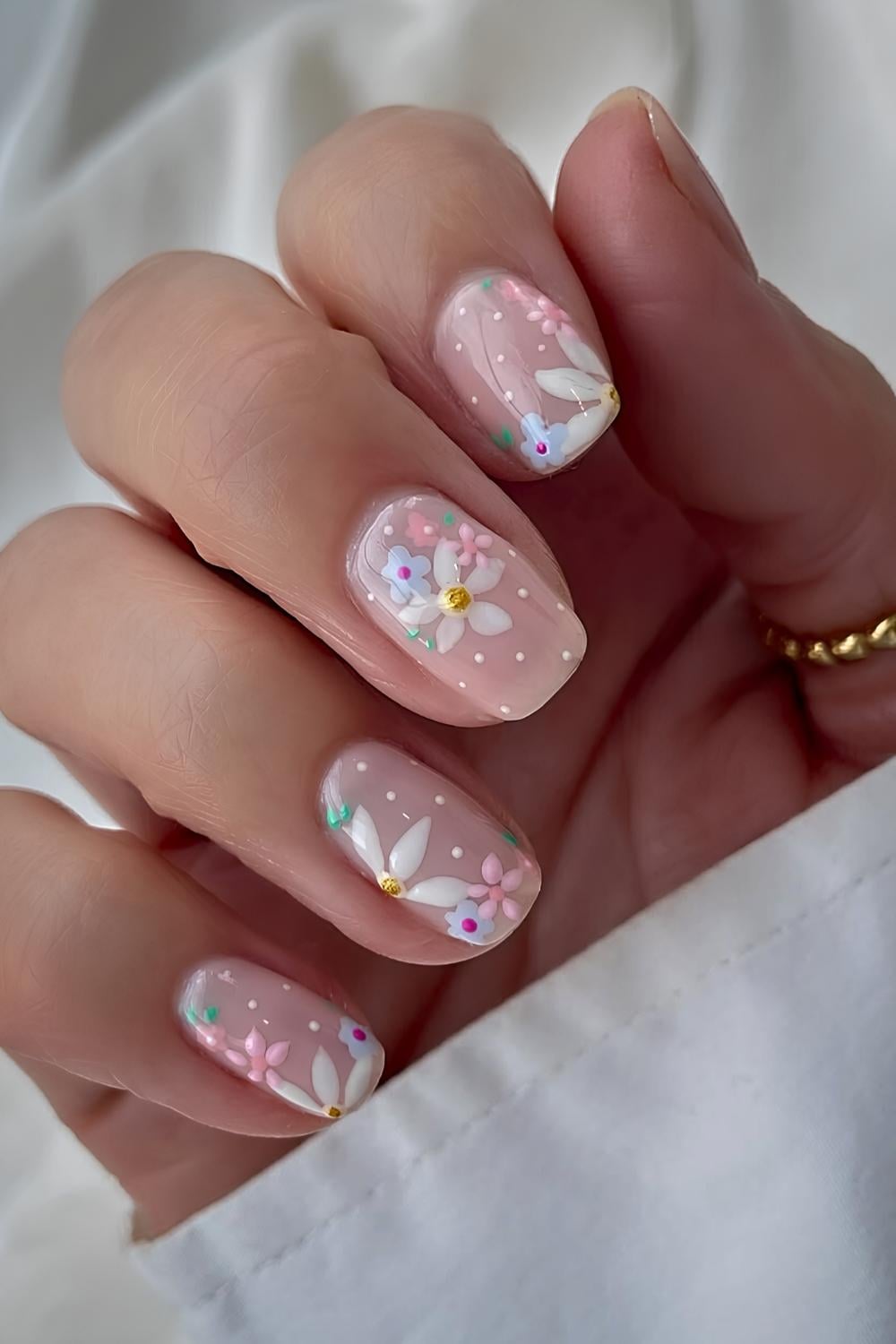 Milky nails with pastel floral art