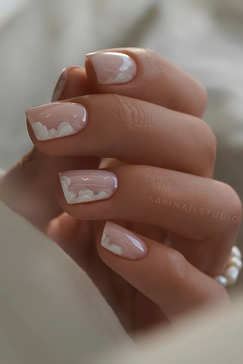 Milky nails with white cloud art