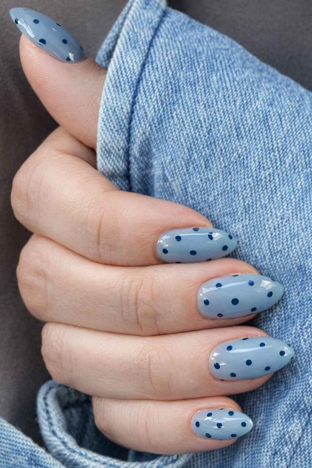 Misty blue nails with polka dots