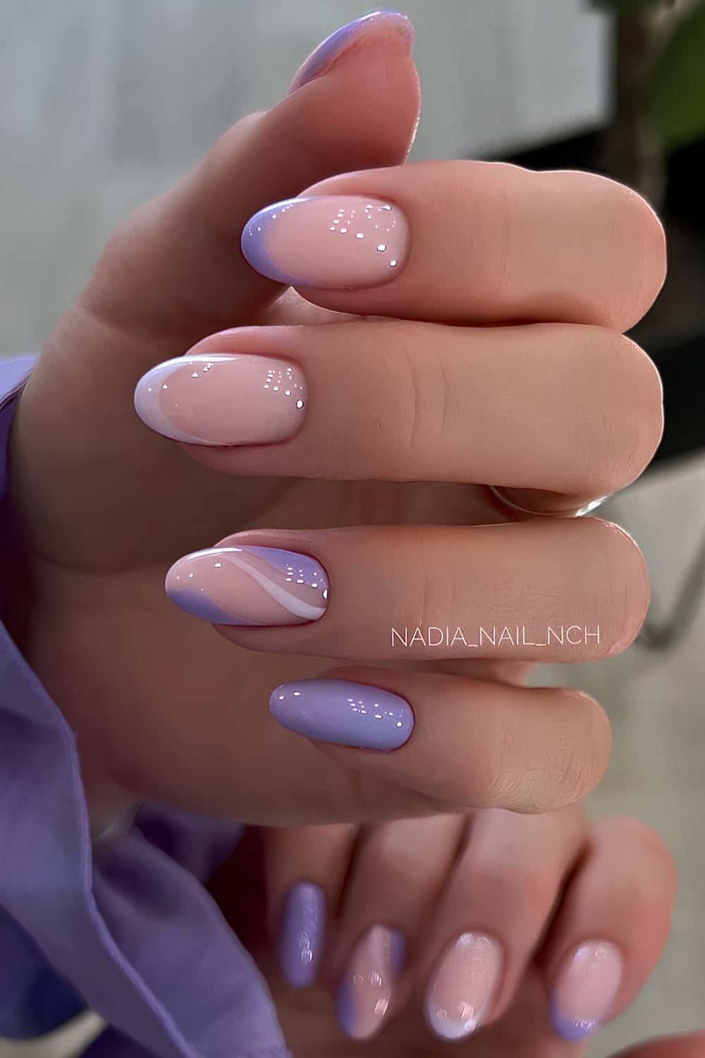 Nails with swirls in two shades of lavender