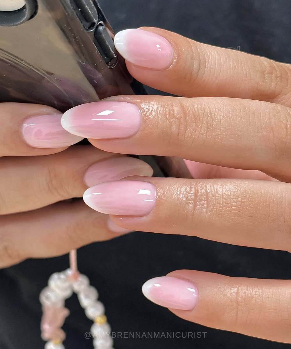 Neutral French mani on milky pink base