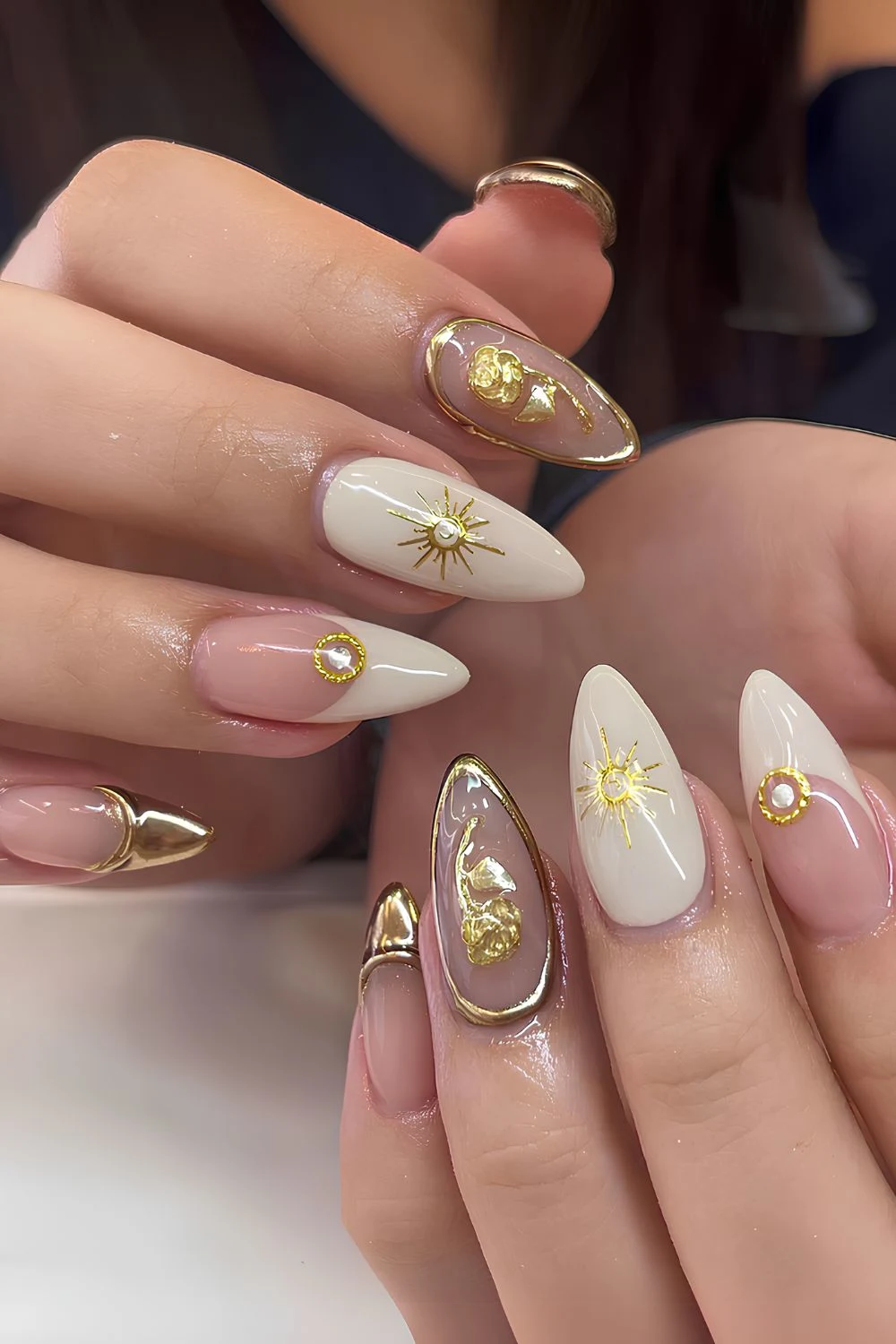 Neutral mix and match nails with gold accents