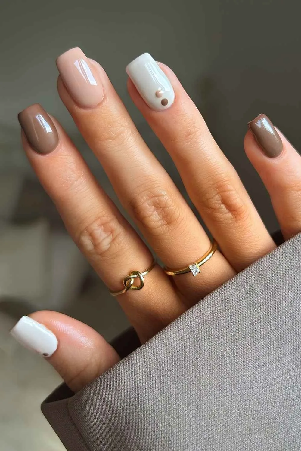 Neutral skittle mani with accent dots