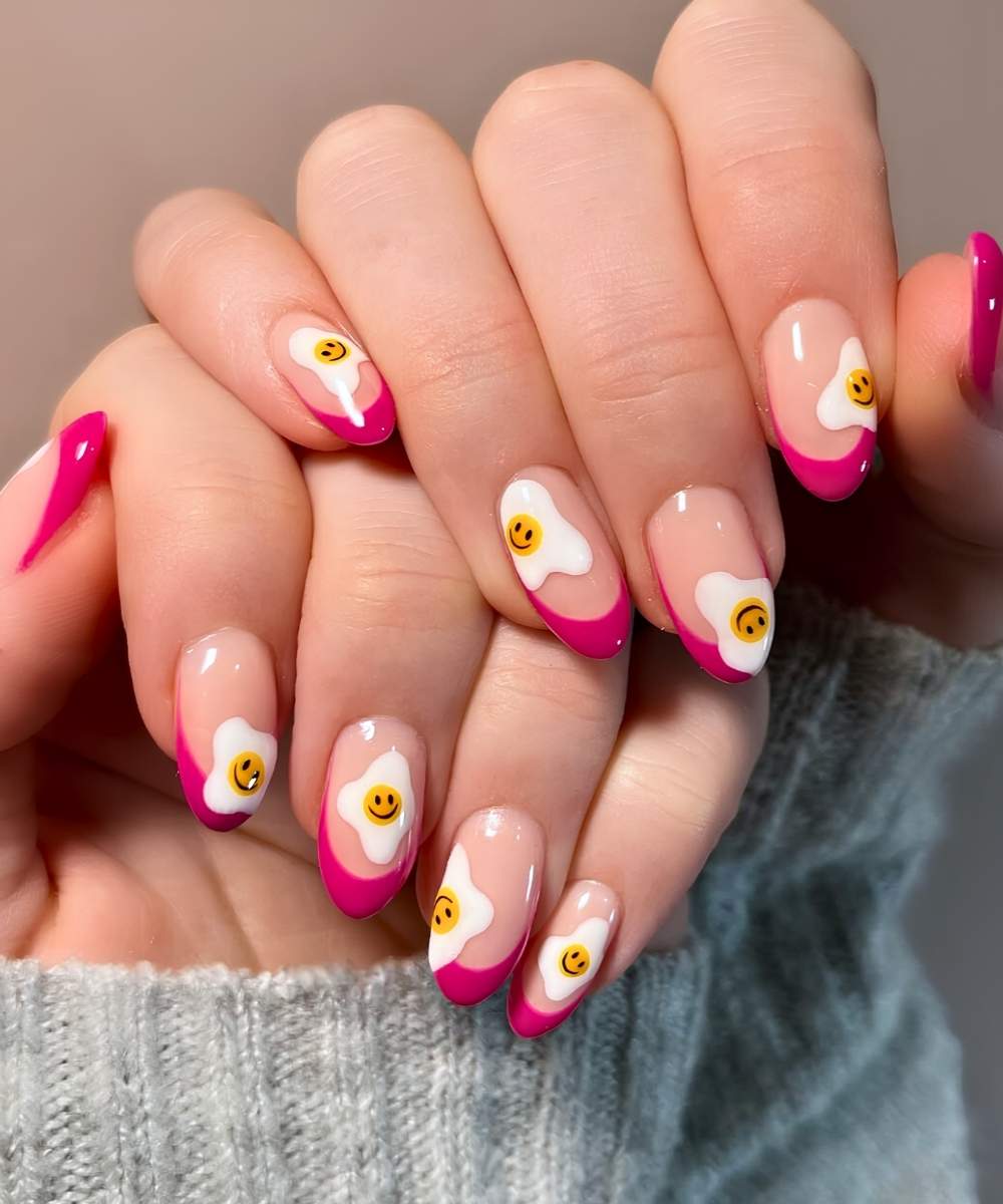 Pink French mani with fried egg art