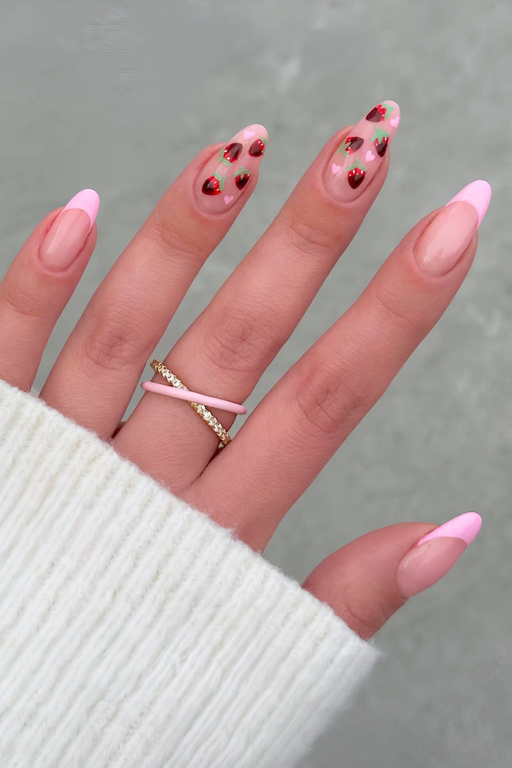 Pink French nails with strawberries and hearts