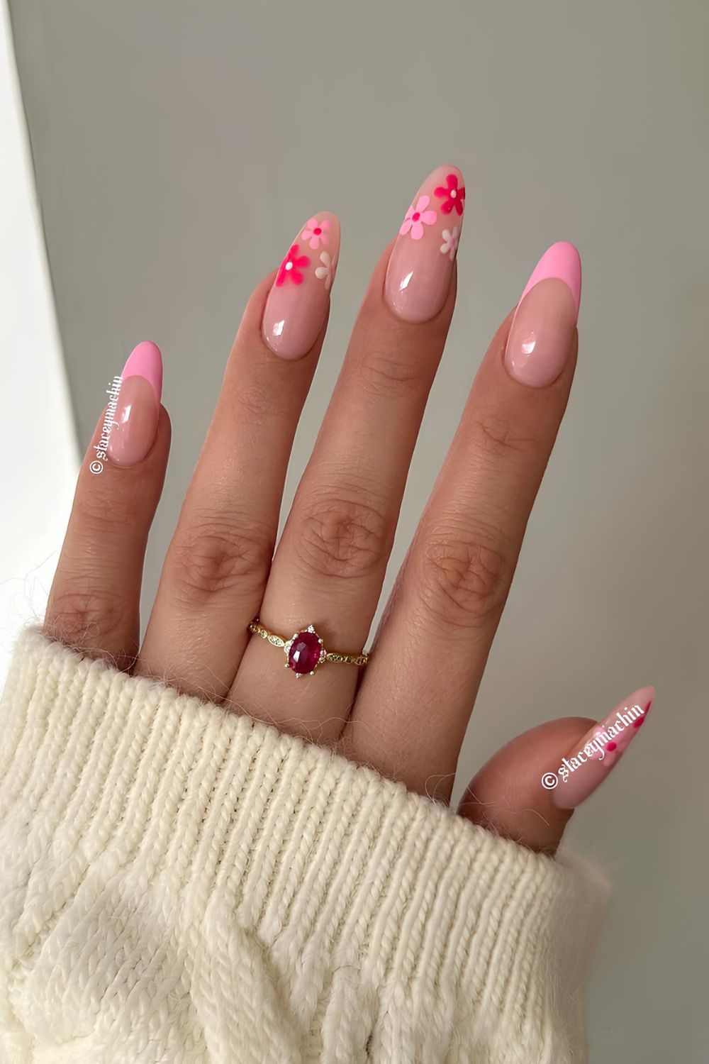 Pink French tips with pink flower accents