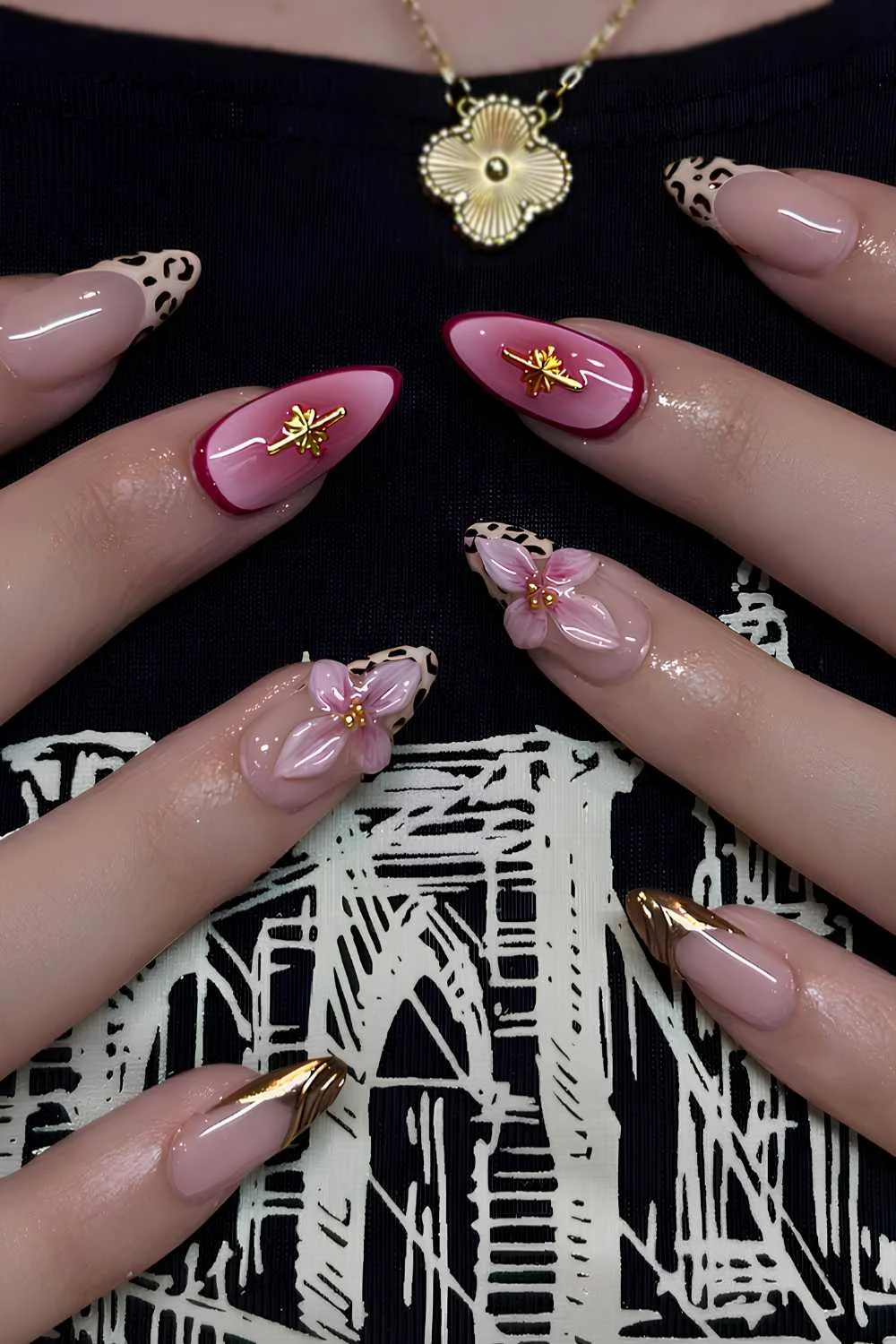 Pink and gold mani with flowers and leopard print