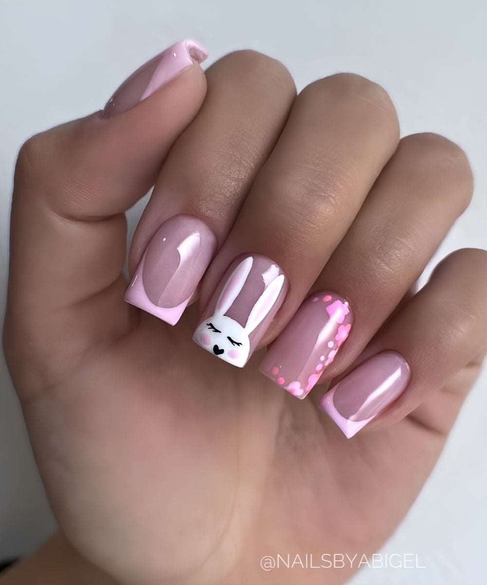 Pink and white French mani with florals and bunny art