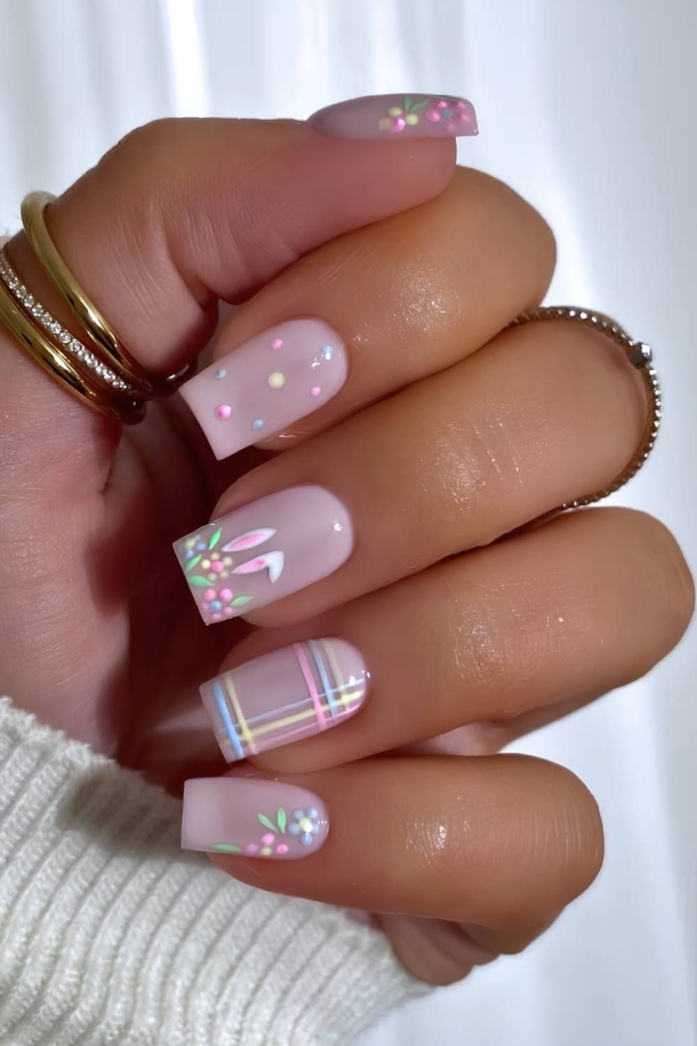 Pink nails with Easter themed art