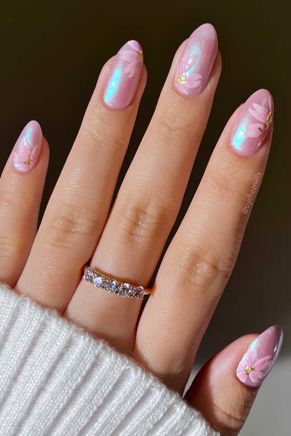 Pink satin nails with cherry blossom art