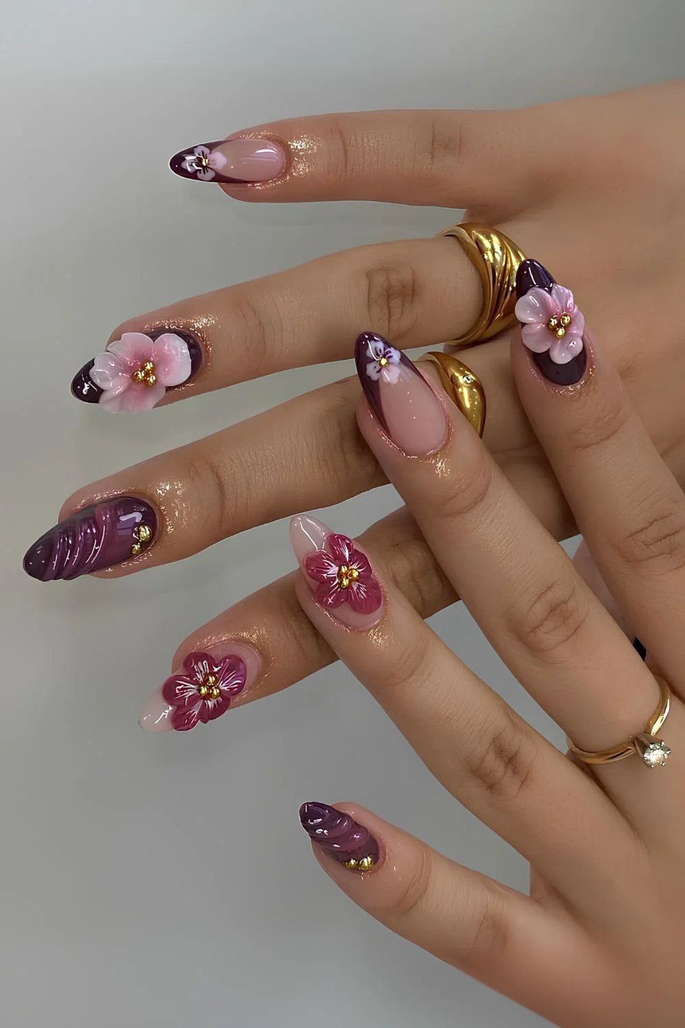 Purple mani with sculpted flower accents