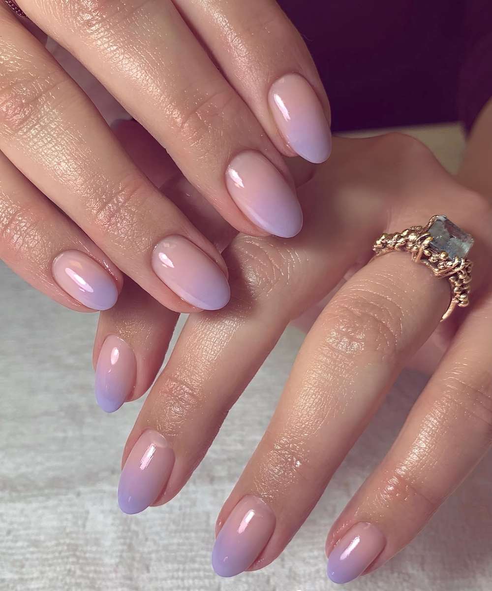 Purple to clear ombre manicure