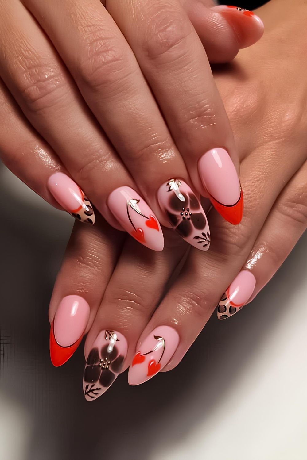 Red and brown nails with cherry and floral art