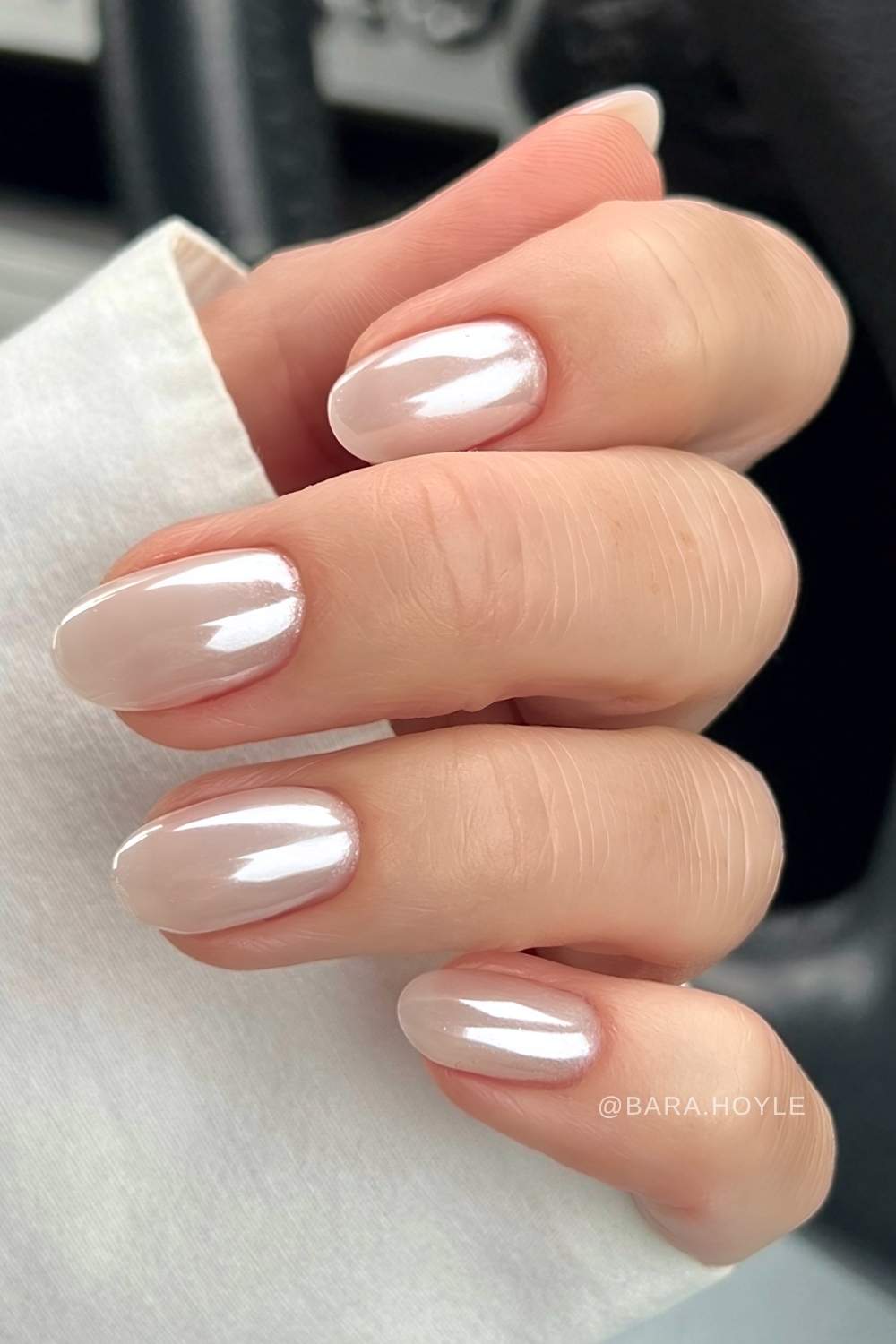Rounded white chrome nails