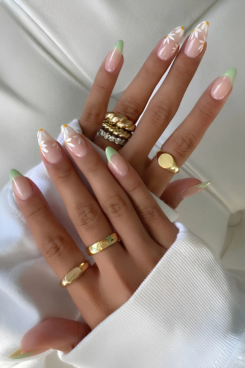 Sage green French nails with daisies