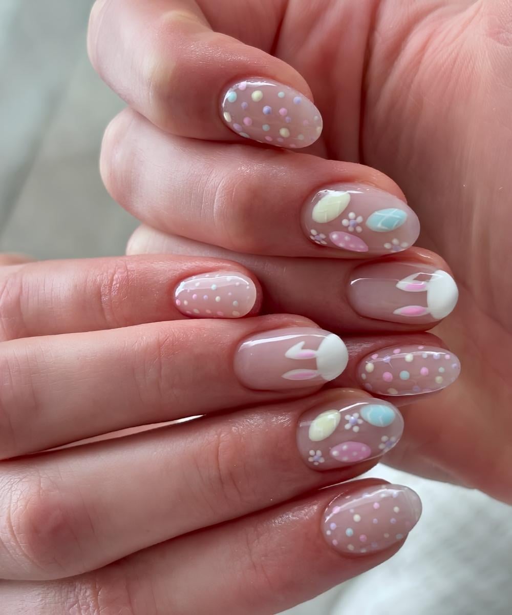 Sheer nails with colorful Easter egg art