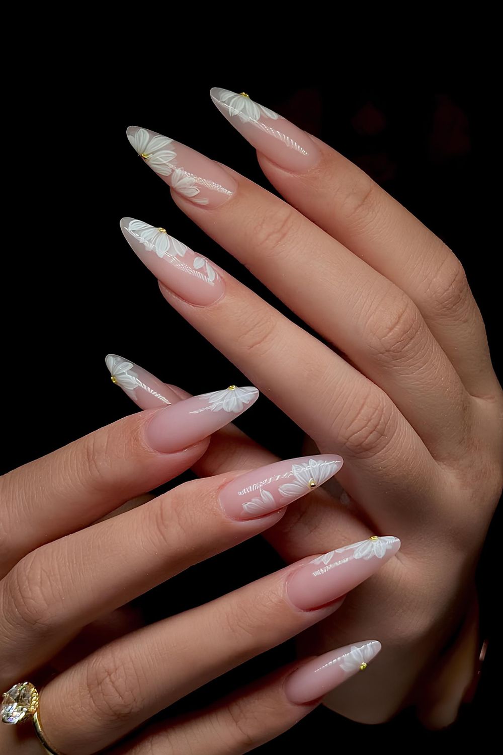 Sheer pink mani with chunky white flowers