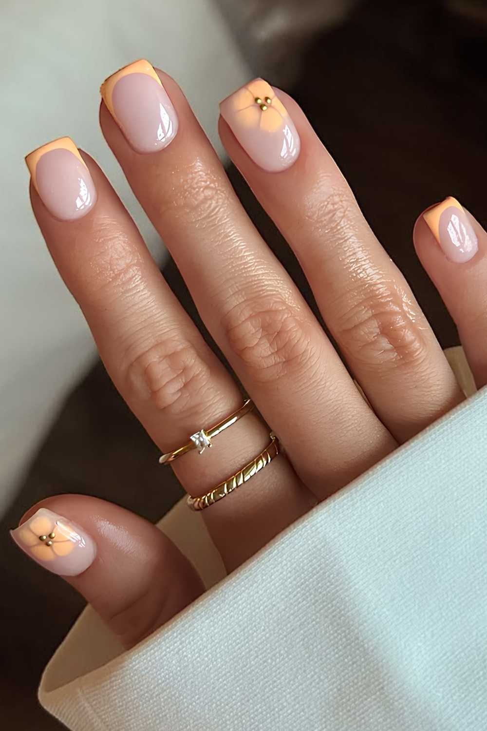 Short peach French mani with floral art