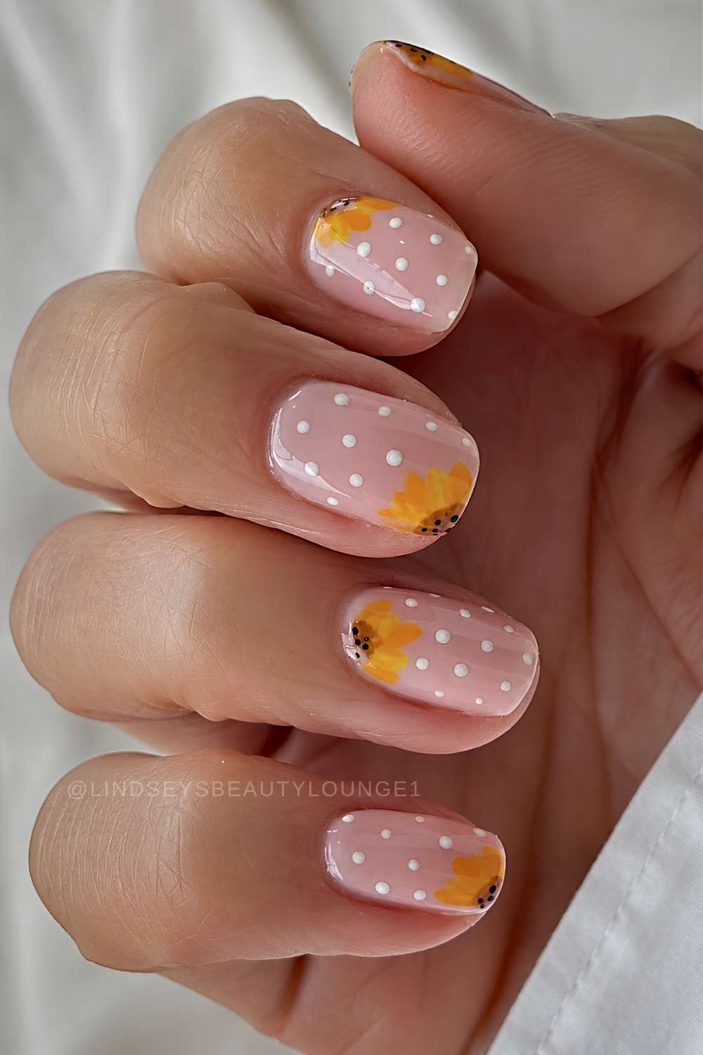 Short sheer polka dot mani with polka dots