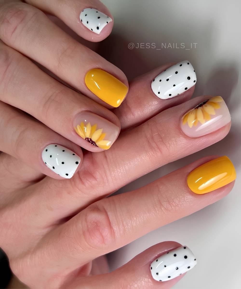 Short white and yellow mani with dots and sunflowers