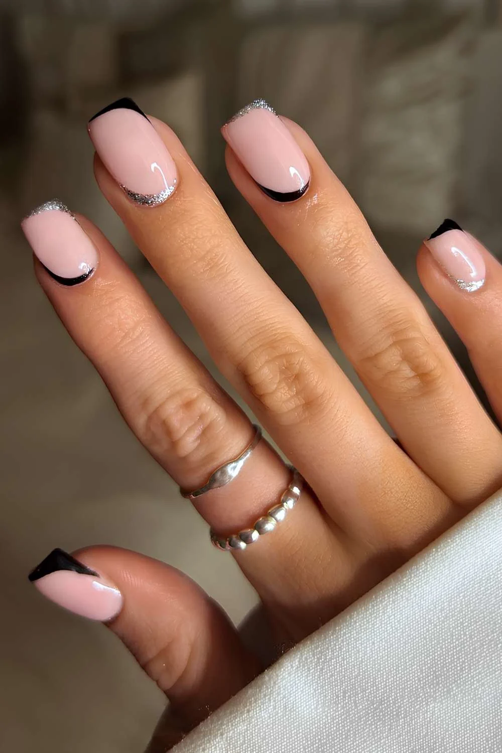 Silver and black upside-down French mani