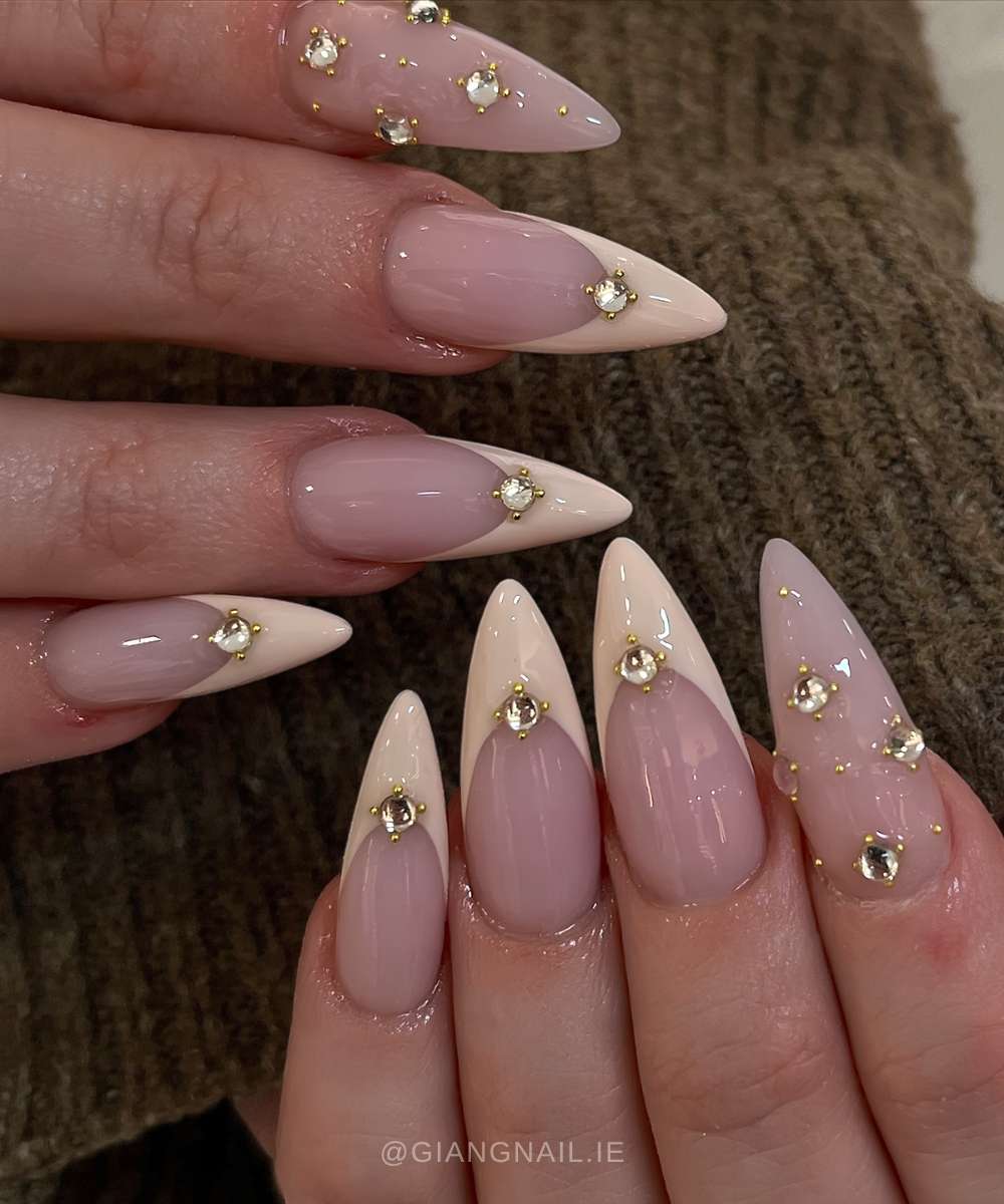 Vanilla French mani with accent gems