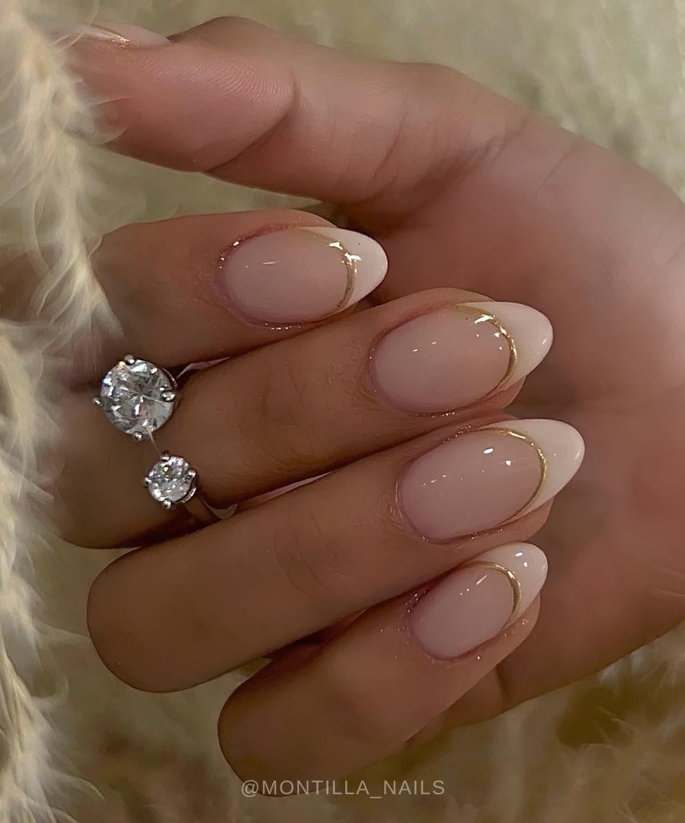 Vanilla French tips with gold outlines
