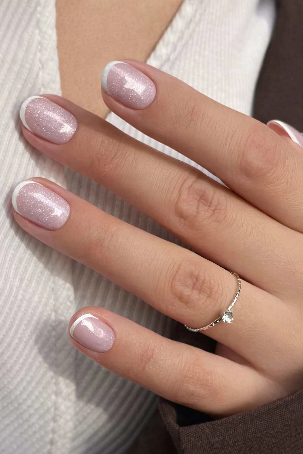 White mini French nails on glitter base