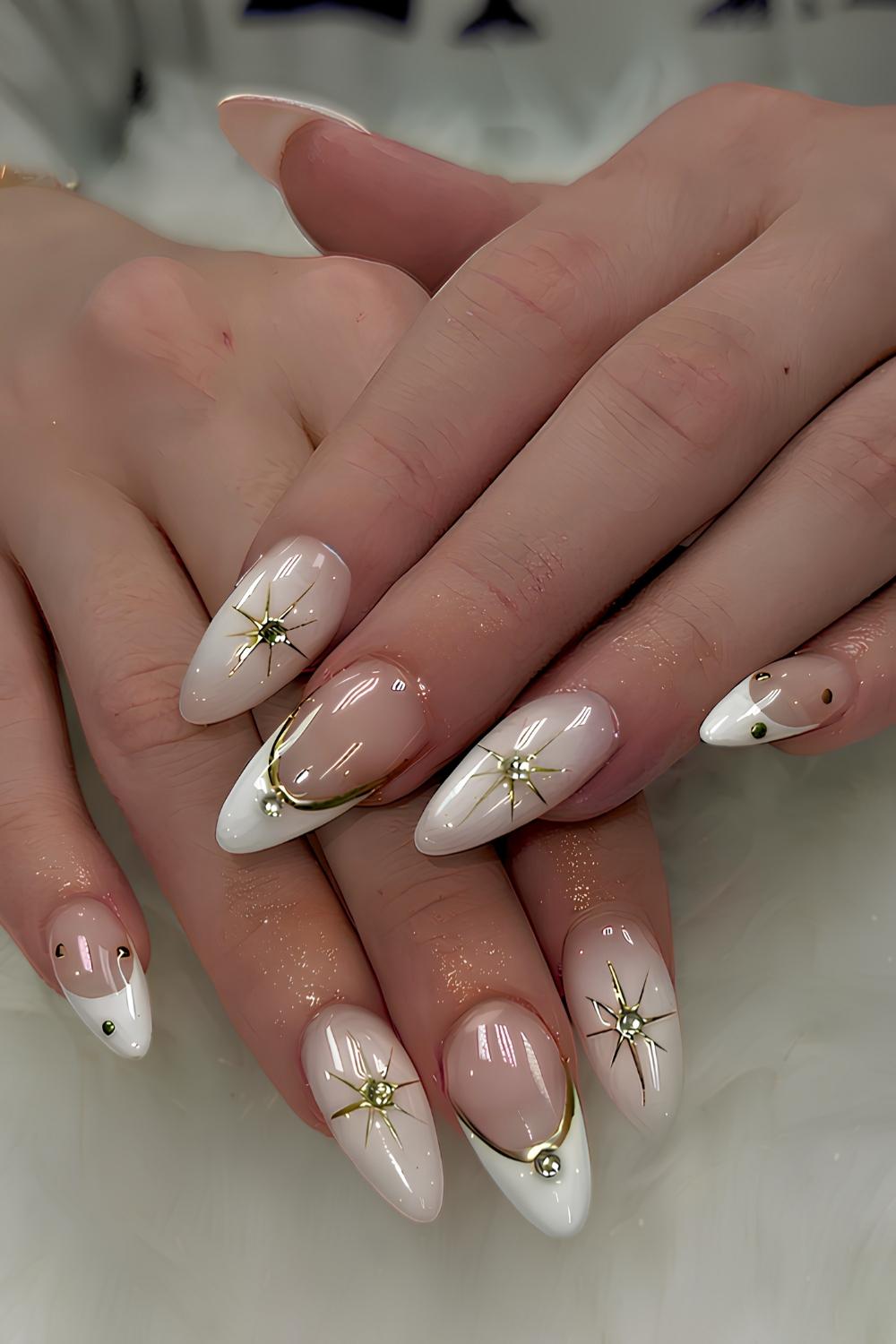 White nails with gold lines and stars