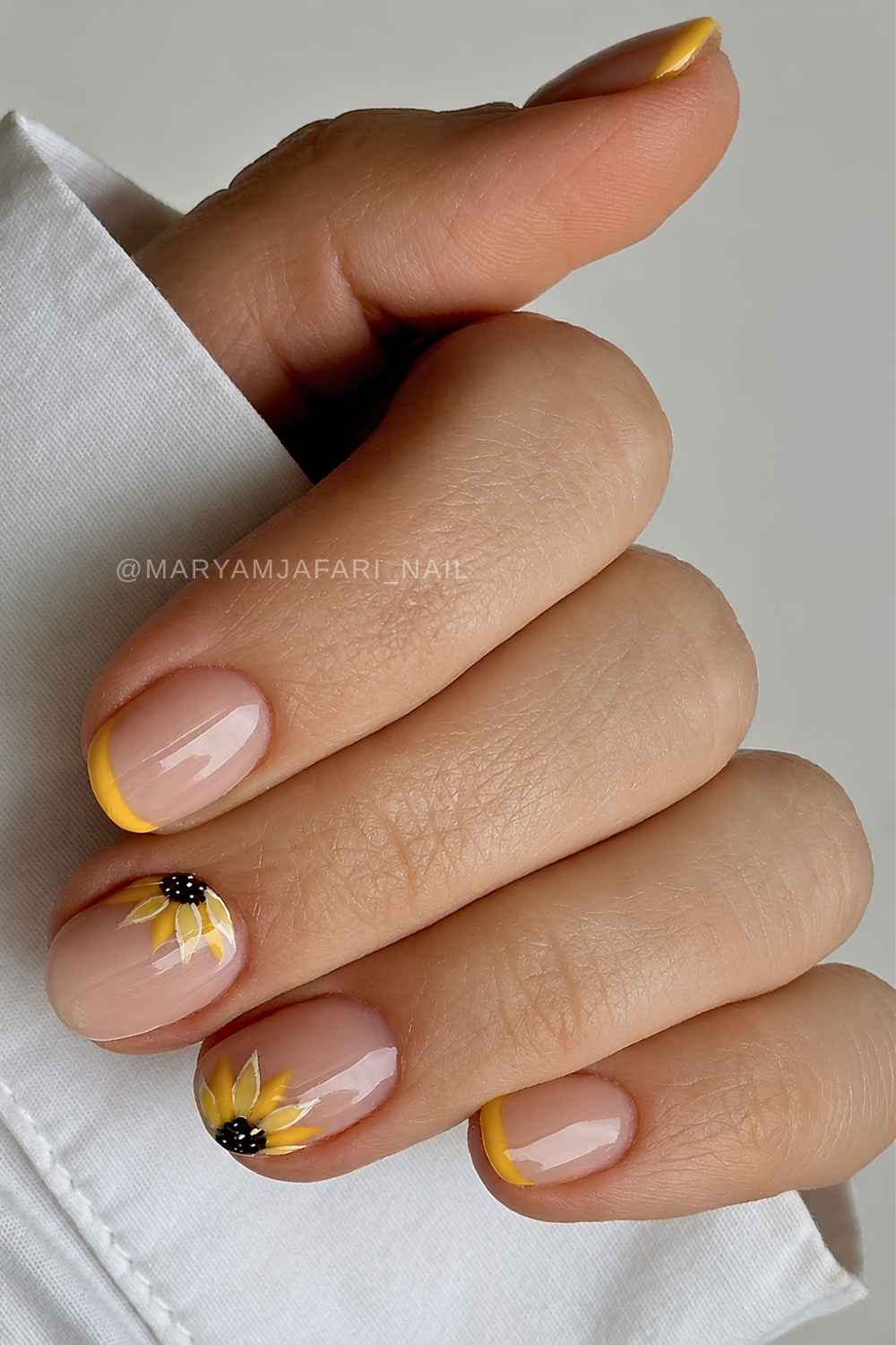 Yellow micro French nails with sunflowers