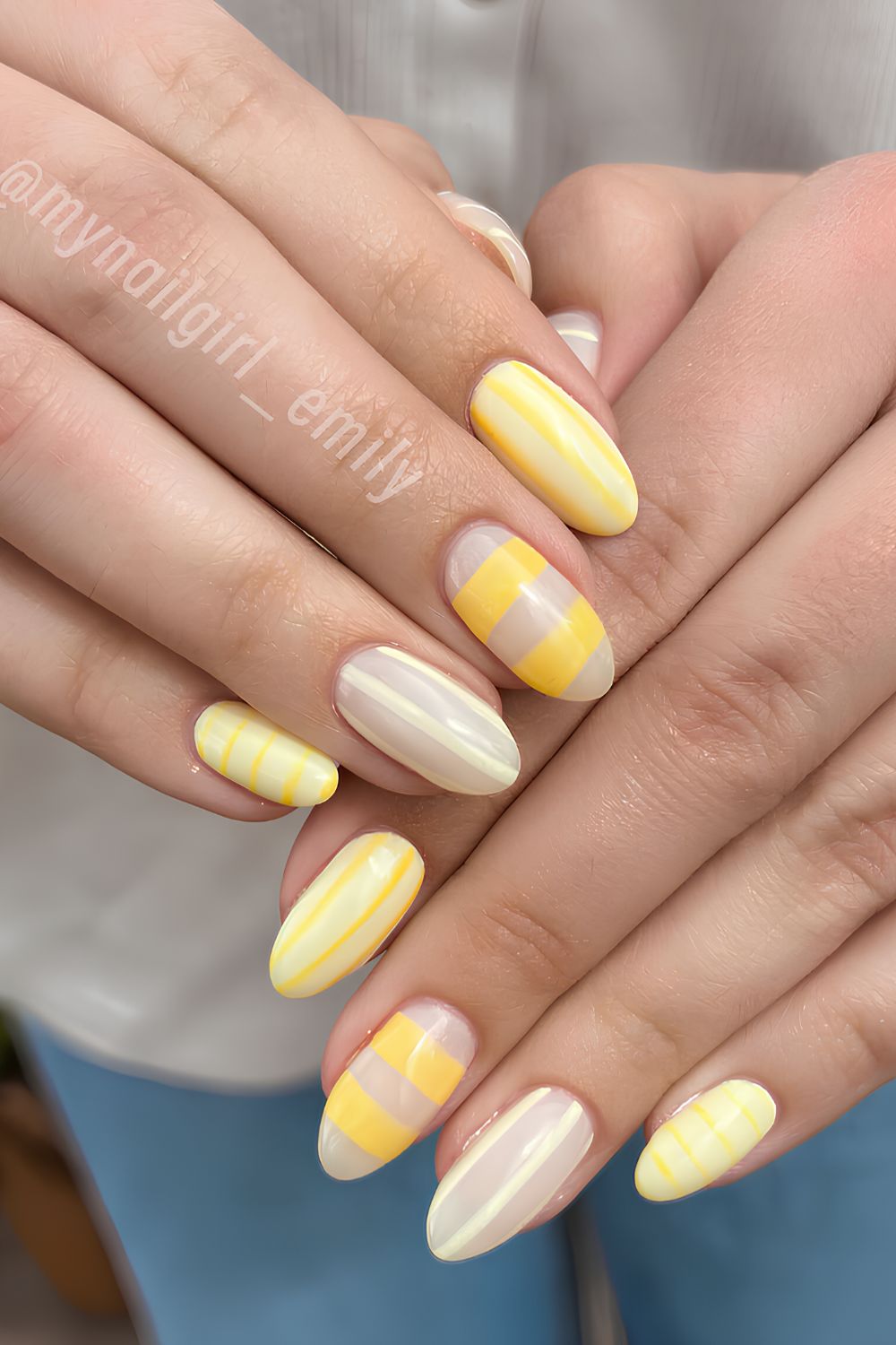 Yellow nails with stripe art