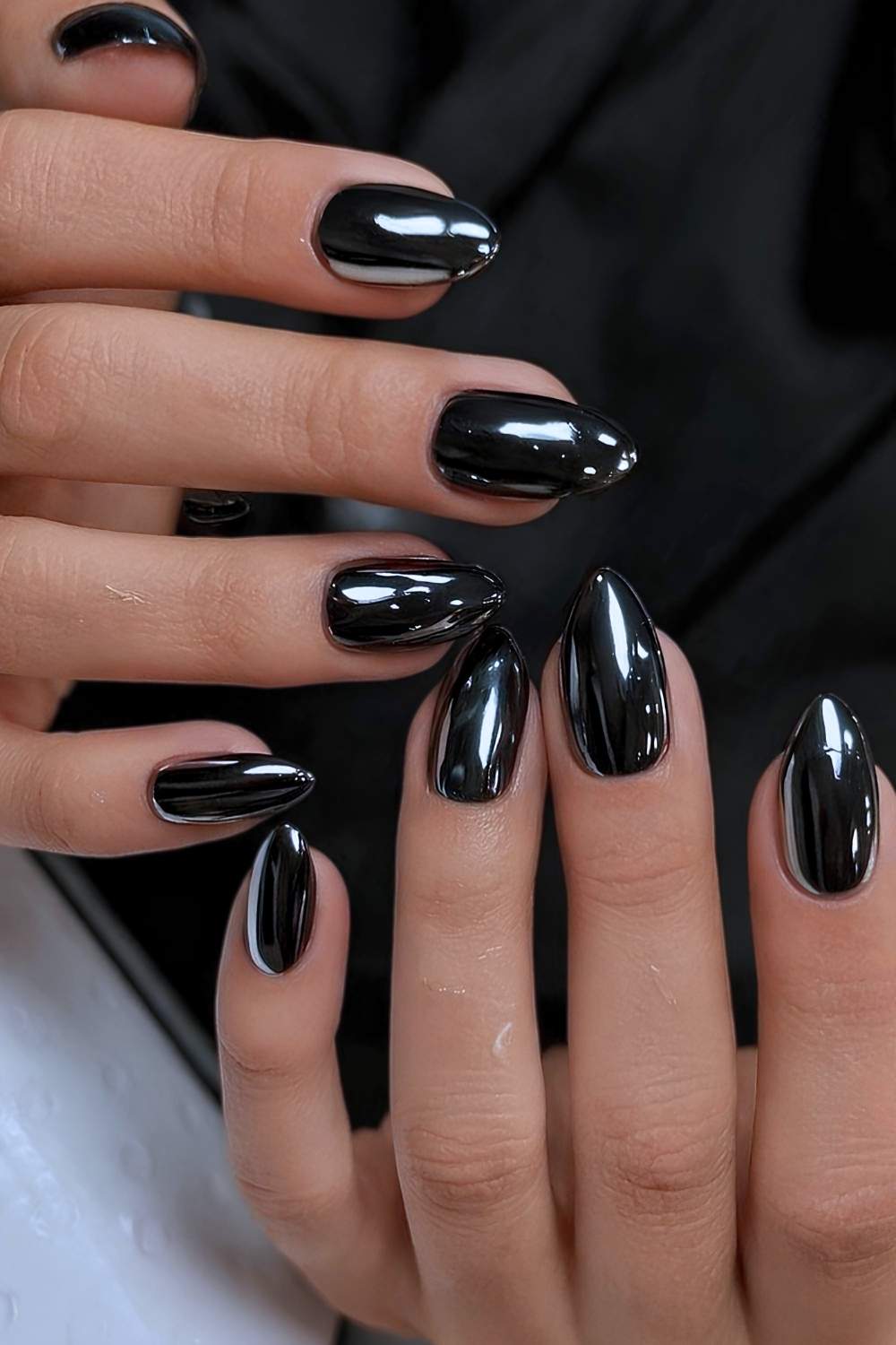 Almond black chrome nails