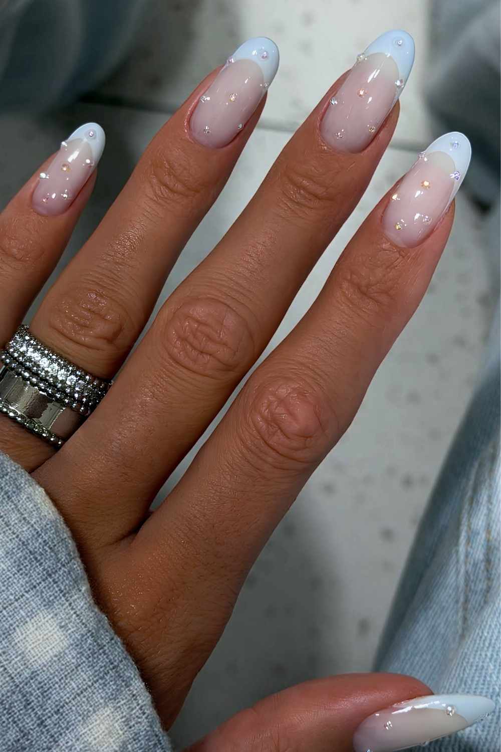 Bedazzled light blue French manicure