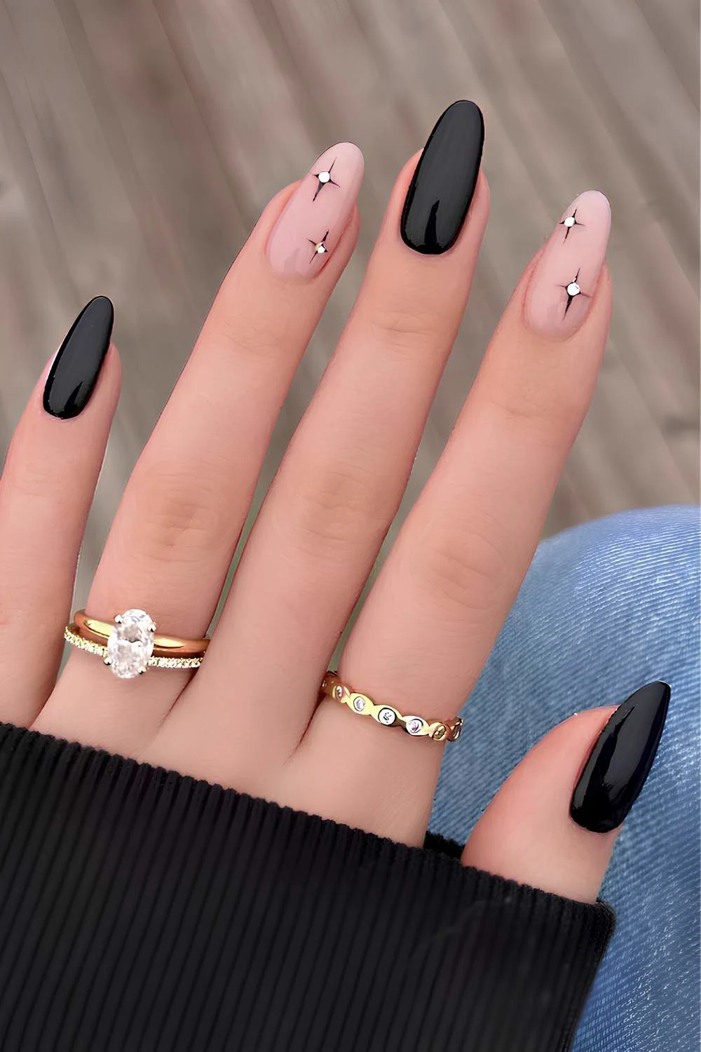 Black manicure with celestial art