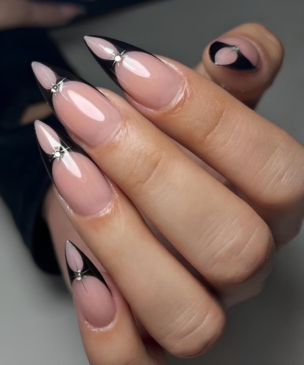 Black negative space French mani with gems