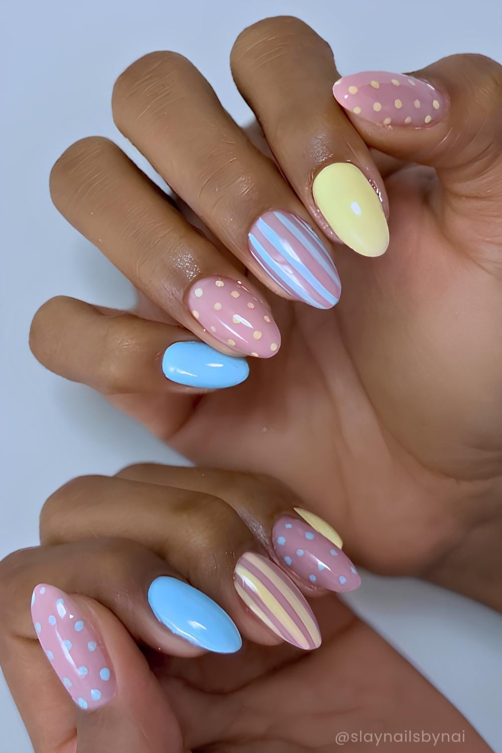 Blue and yellow spring nails with dots and stripes