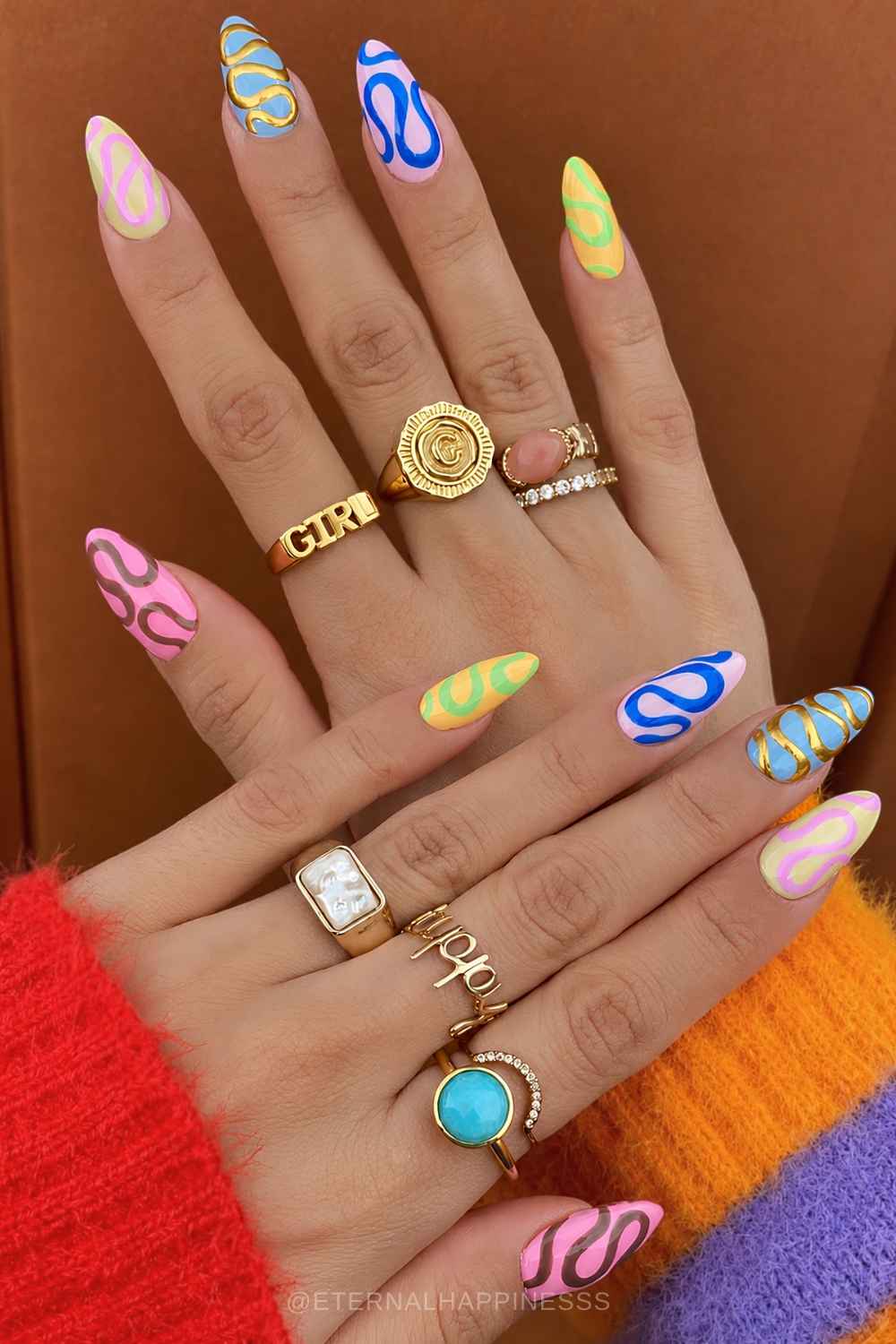 Colorful dopamine nails with swirls