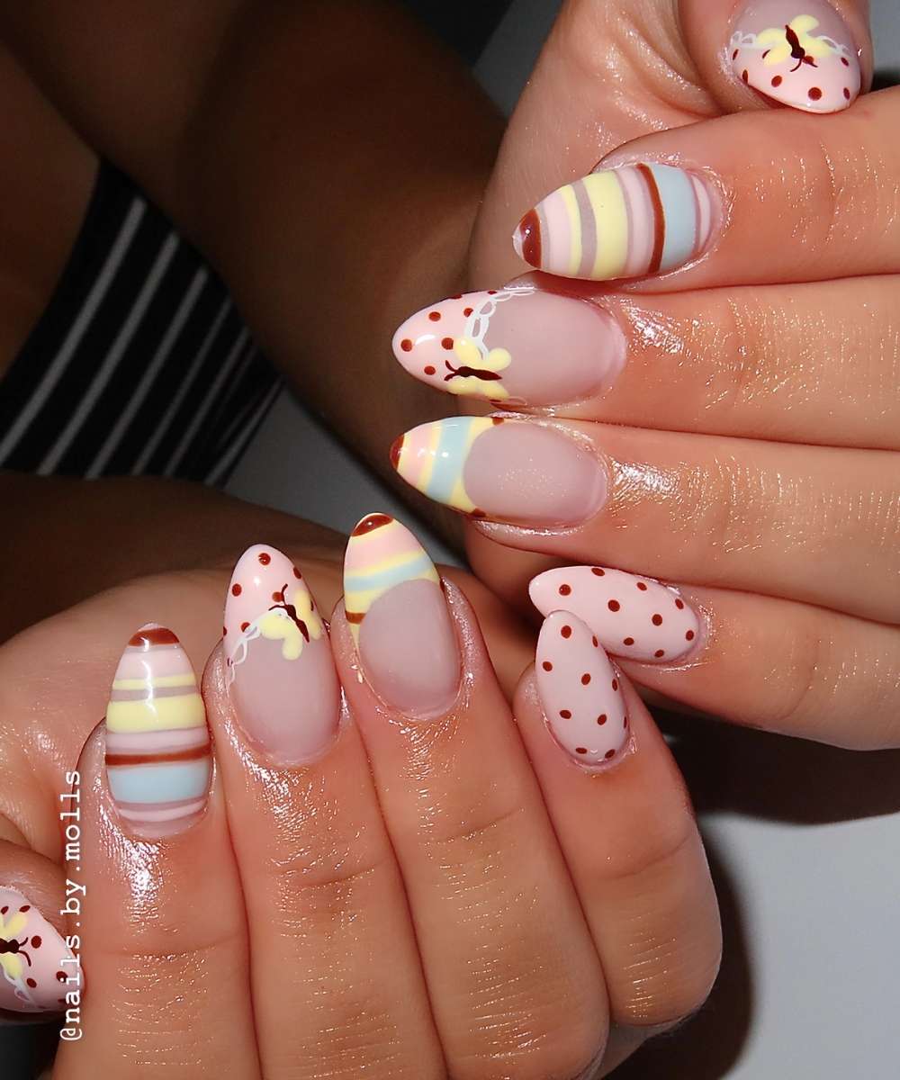 Colorful mixed pattern mani with butterflies