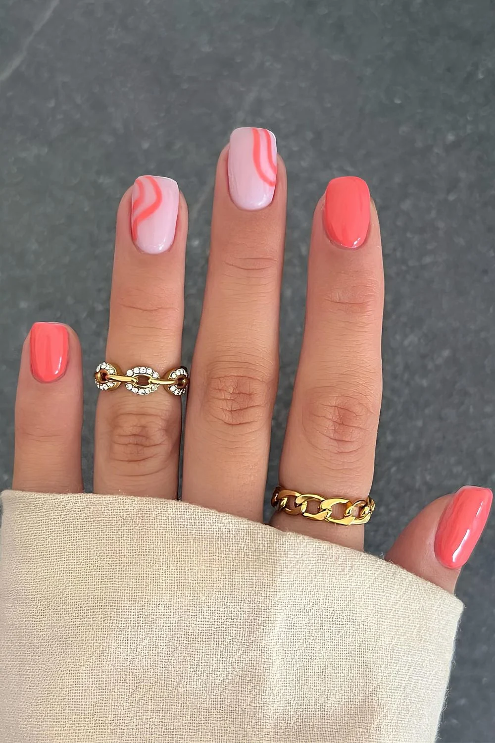 Coral nails with swirls