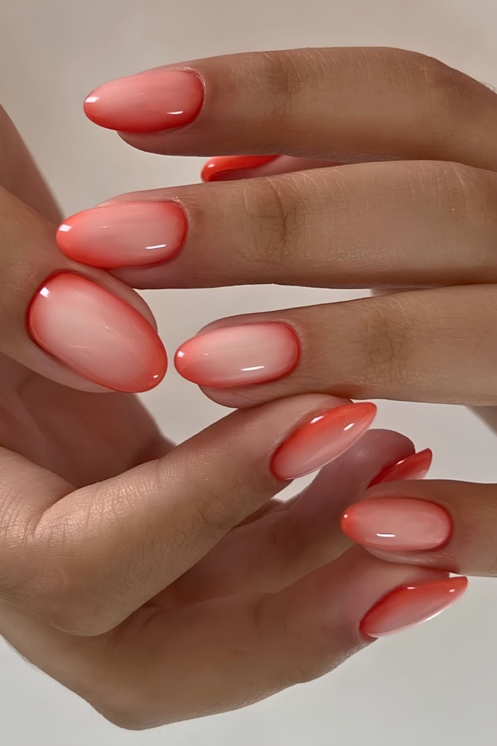 Coral peach nails with aura shading