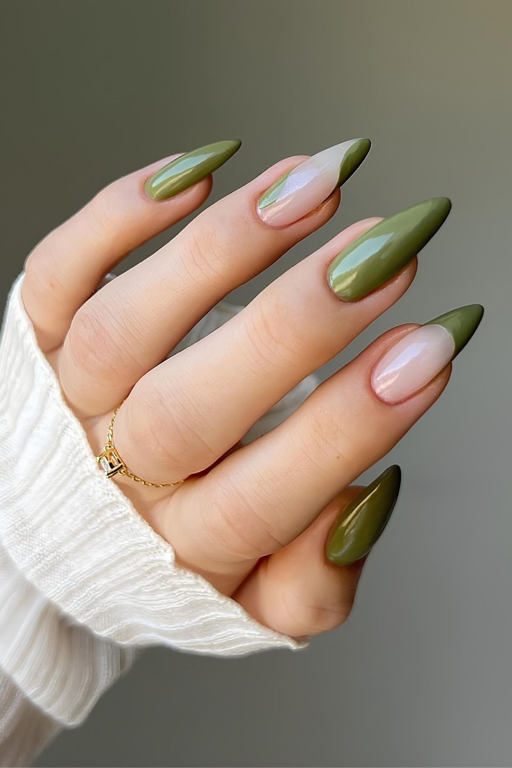 Dark olive nails with negative space and French tip accent