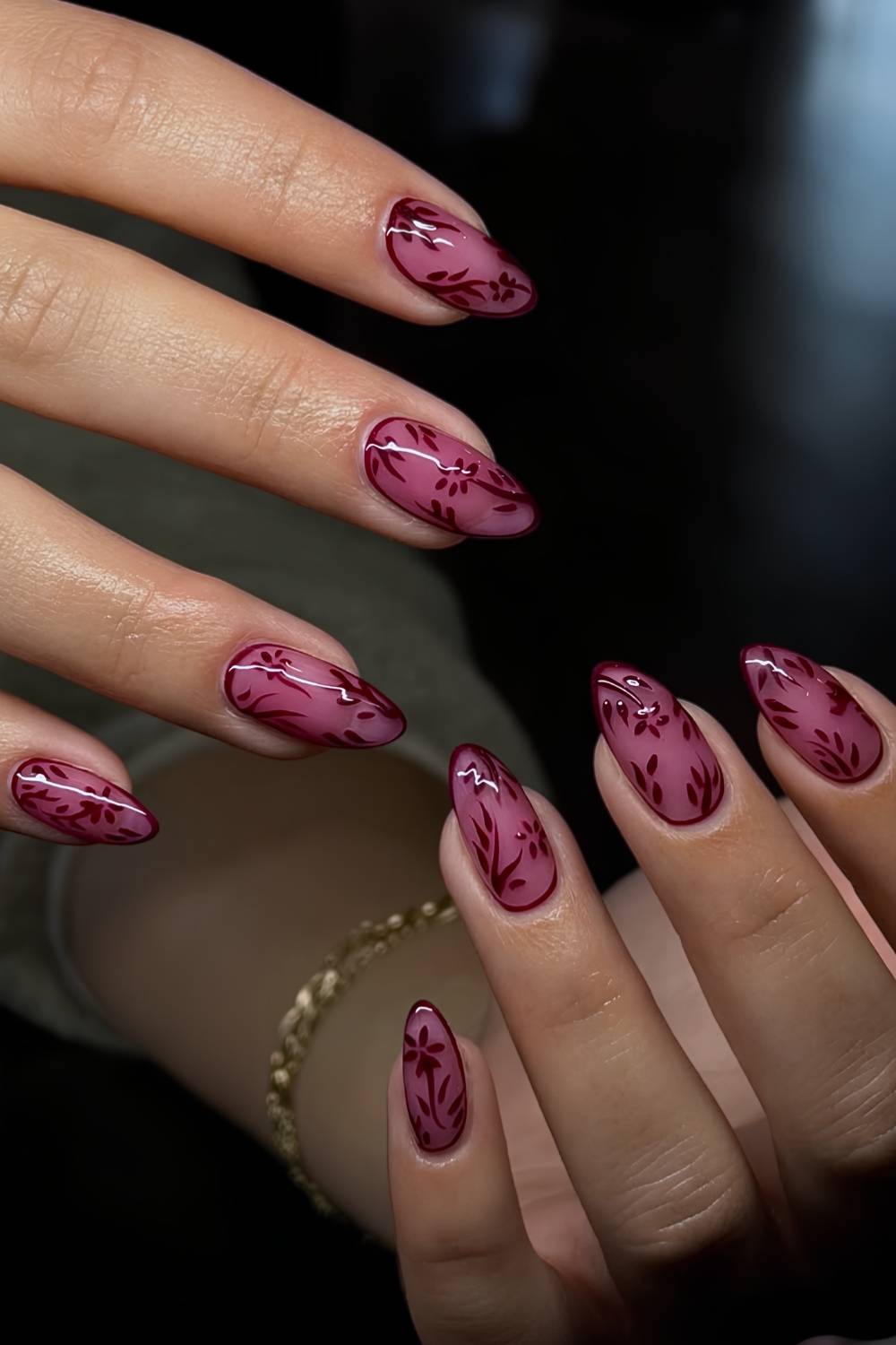 Deep red mani with lace inspired florals