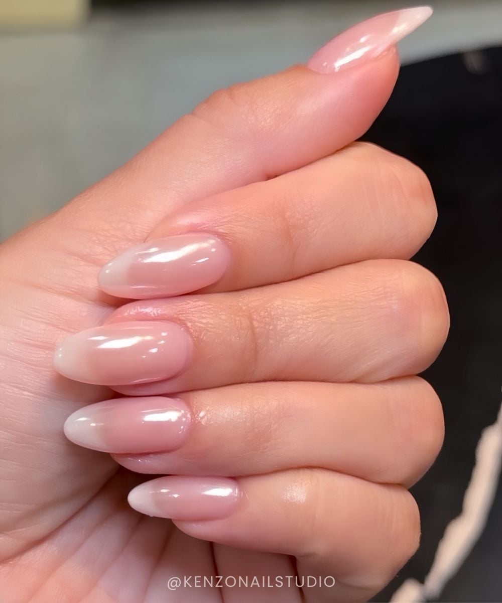 Glossy neutral muted French tip nails