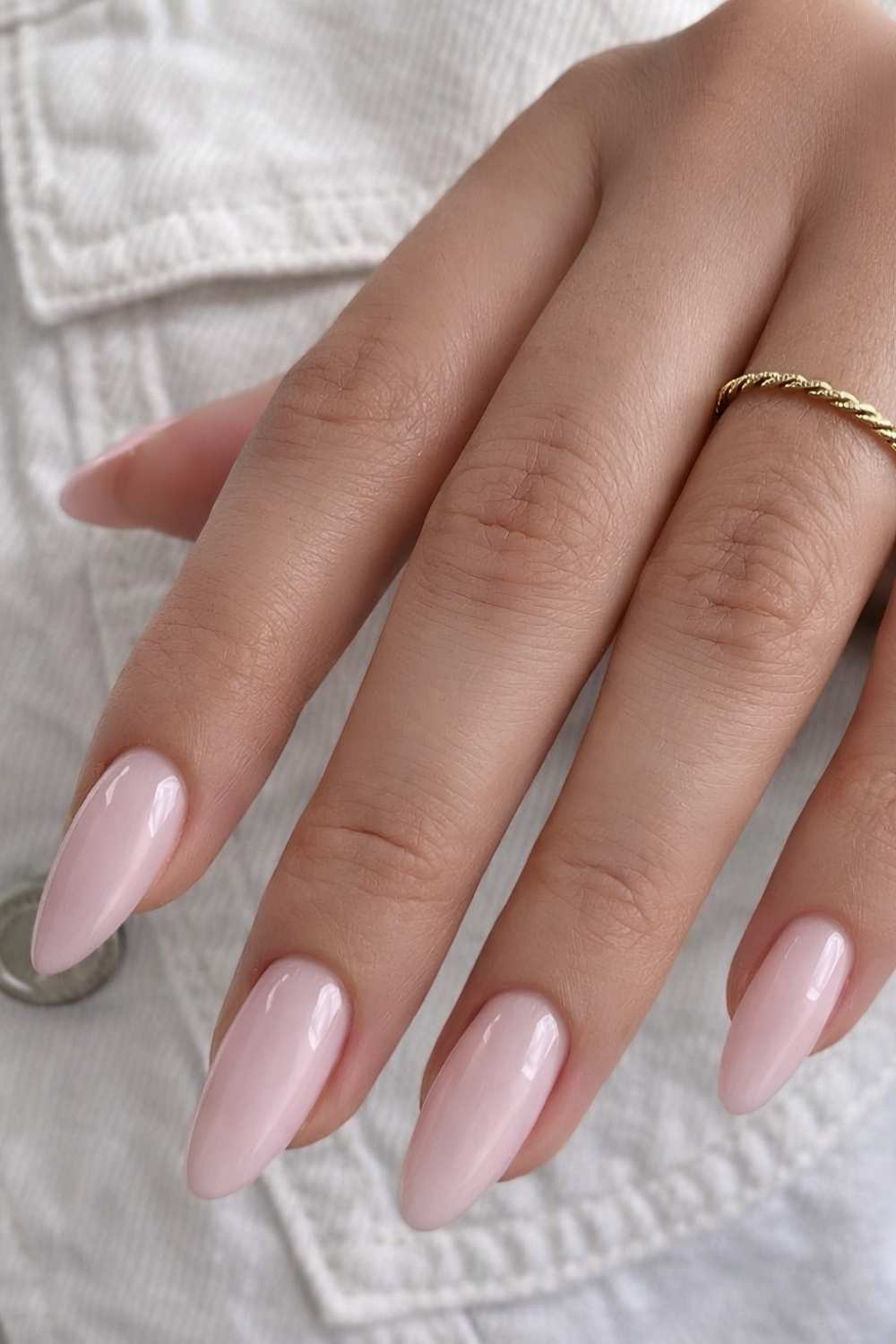 Glossy pale pink manicure
