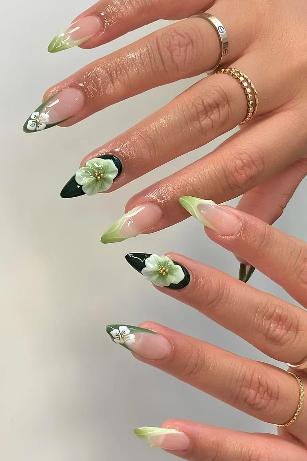 Green French nails with mix and match design