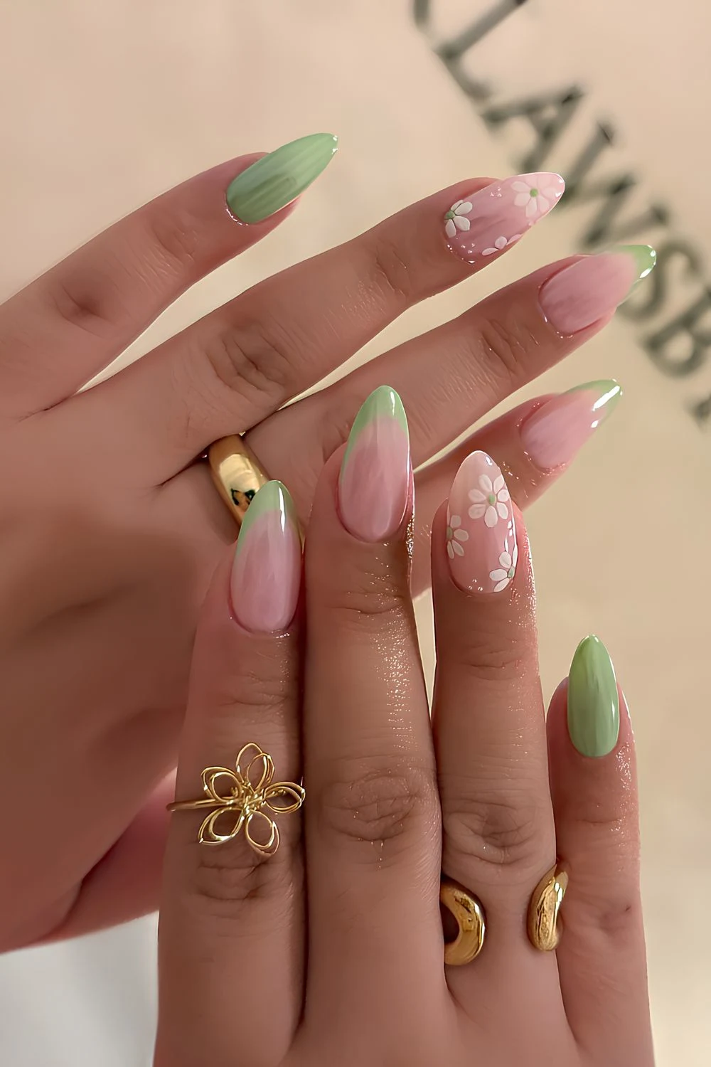 Green chrome nails with flowers