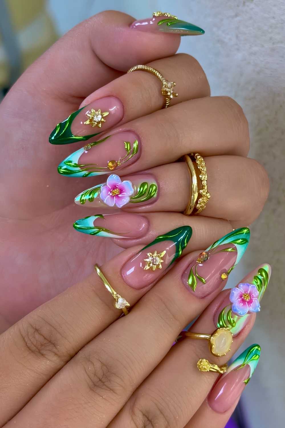 Green spring nails with 3d swirls and flowers