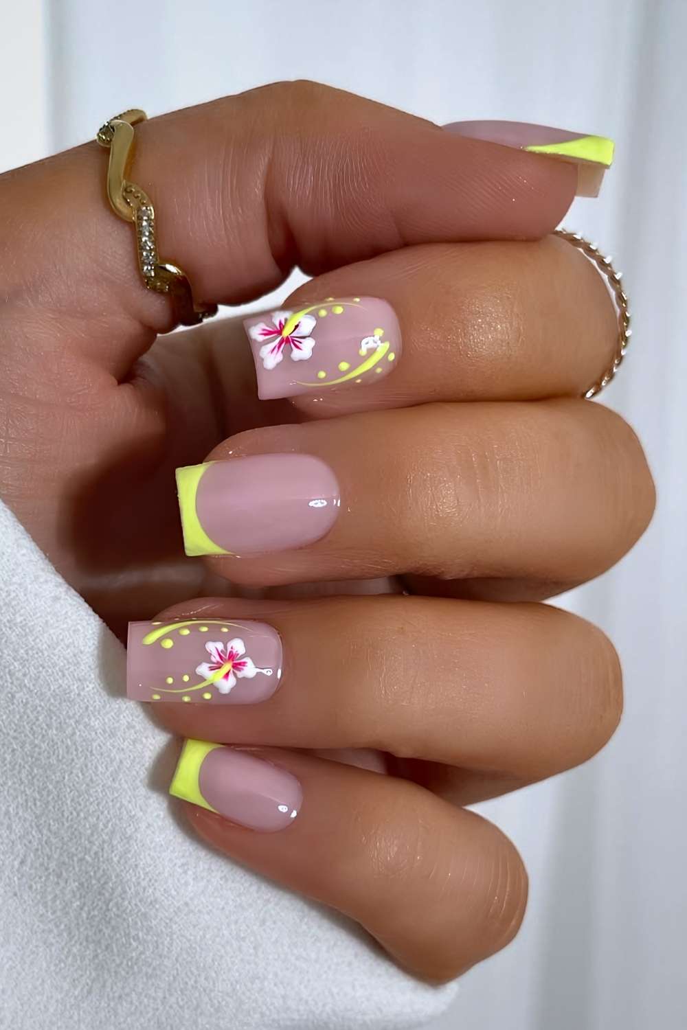 Highlighter yellow French nails with florals